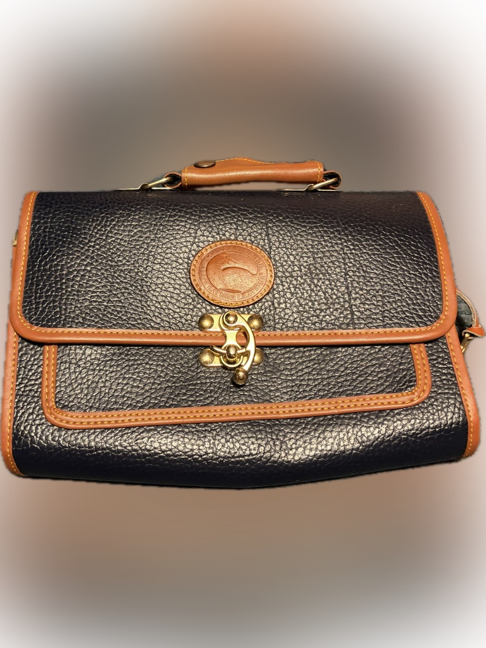 Dooney & Burke Textured Navy Blue Clutch with Tan Trim and Gold Hardware